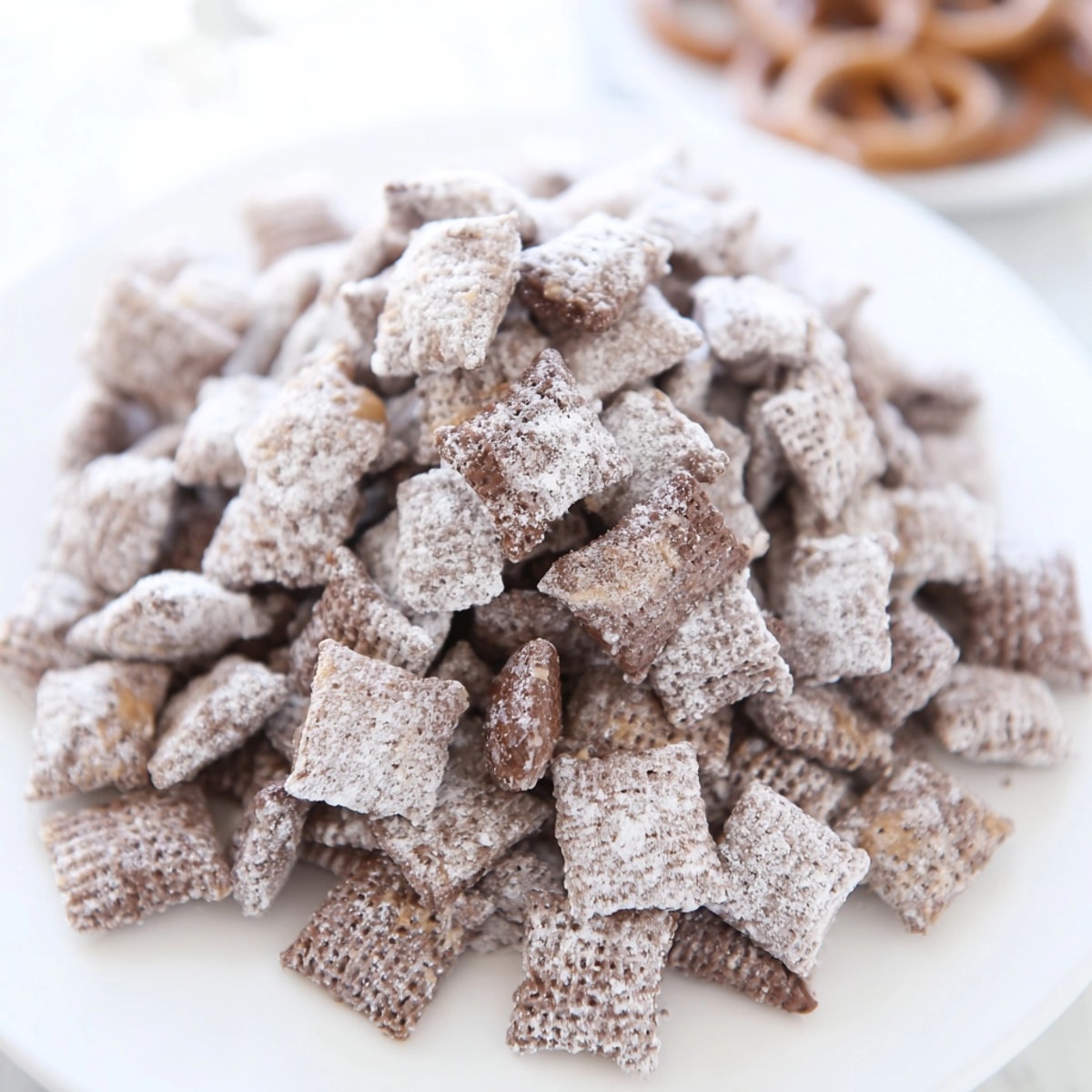 A bowl full of crunchy Puppy Chow recipe snack, perfect for after-school treat.