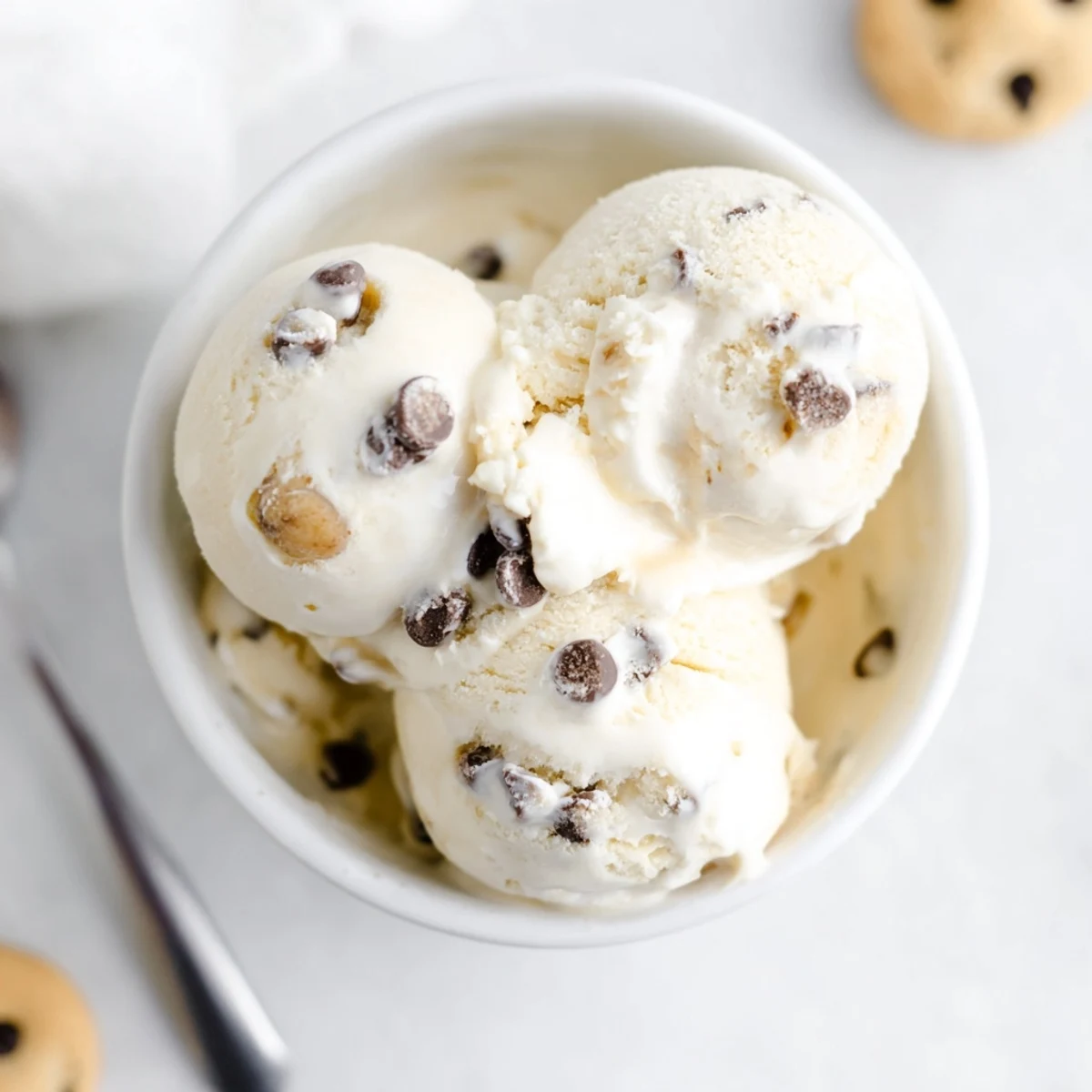 Creamy cottage cheese ice cream adorned with edible cookie dough bites.