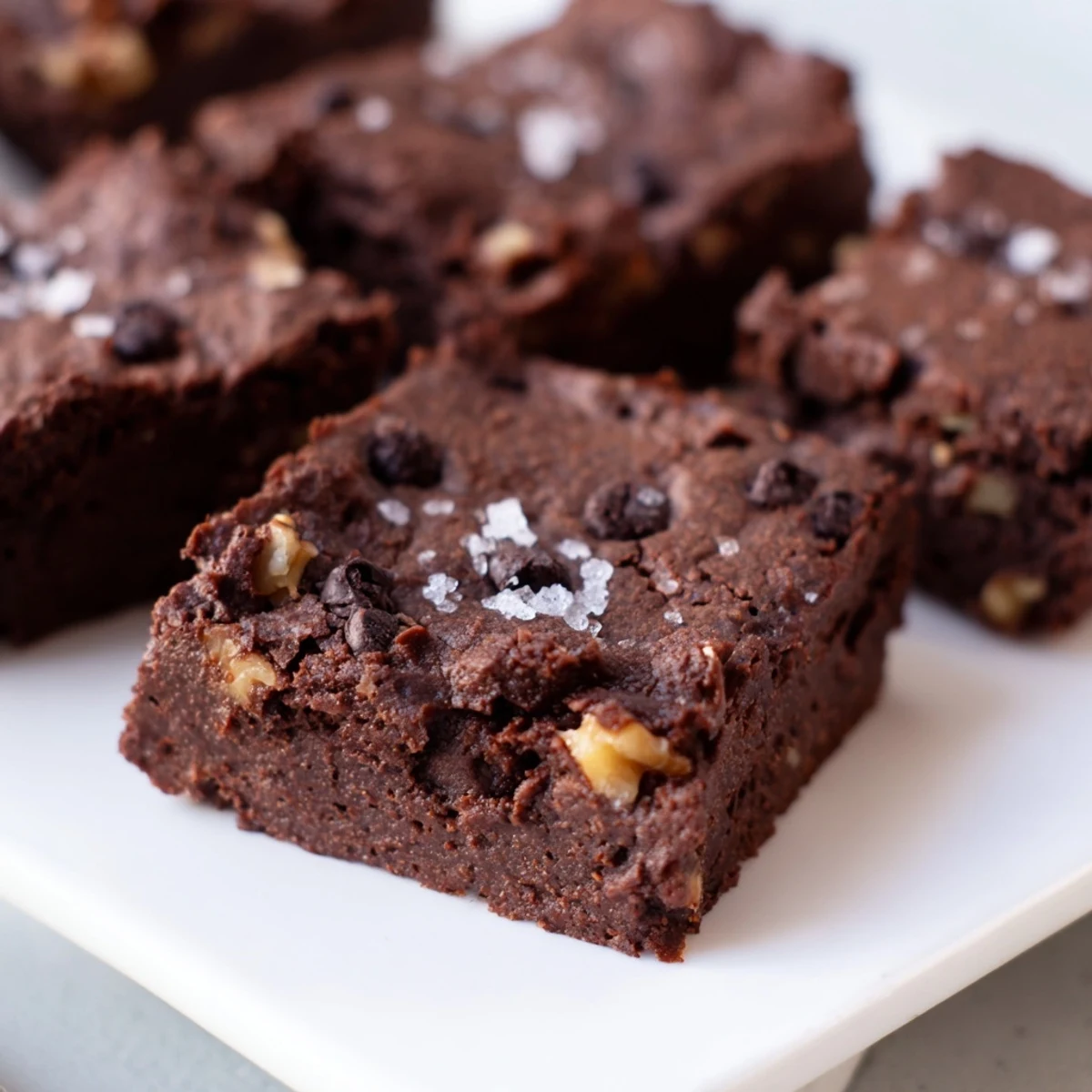 Warm, gooey sweet potato brownies, studded with dark chocolate chips, baked to perfection.