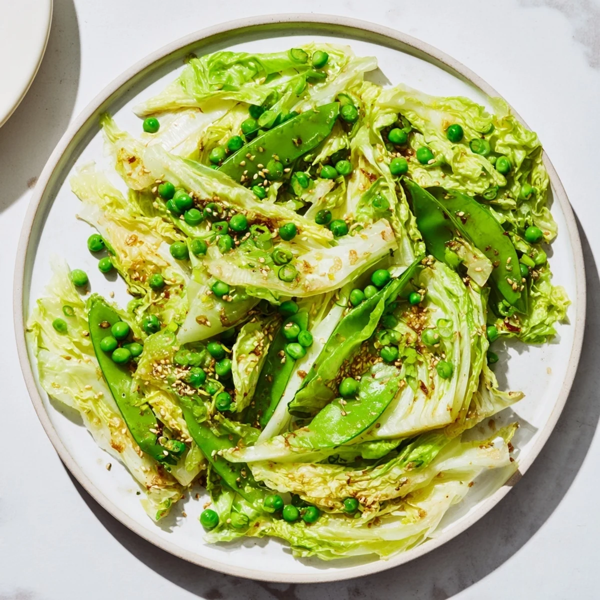 This vibrant Cabbage Stir-Fry combines tender cabbage with a delicious and flavorful garlic-soy glaze.