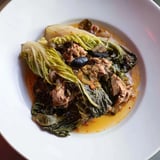 Hearty Southern collard greens simmering with smoked turkey, perfect for a cozy, delicious meal.