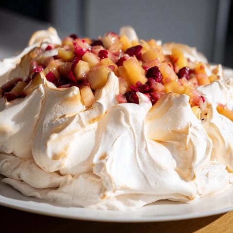 This Cranberry and Pear Snowscape, baked until bubbly, shows sweet pears and ruby cranberries.