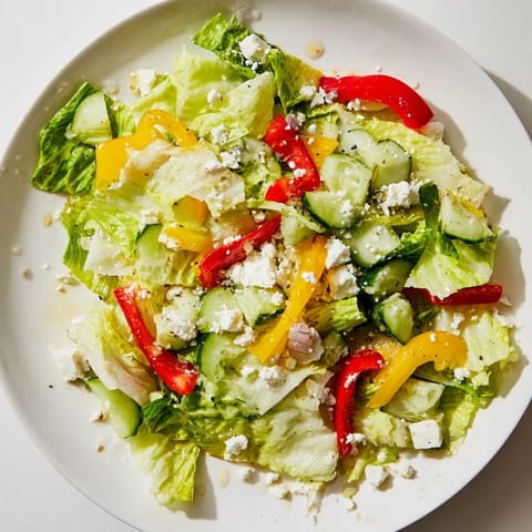 Vibrant image of Bella Hadid Salad featuring colorful veggies and creamy feta, perfectly tossed.