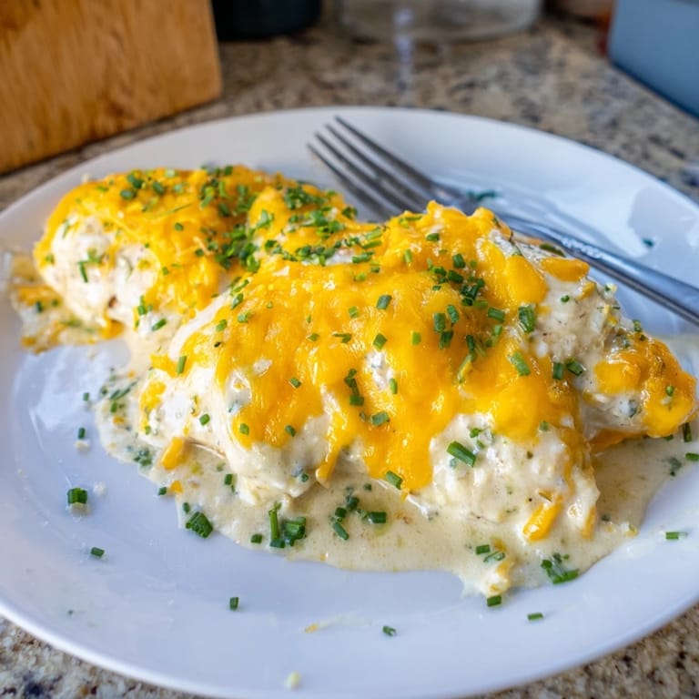 Creamy ranch sauce coats juicy chicken breasts in this comforting casserole.  