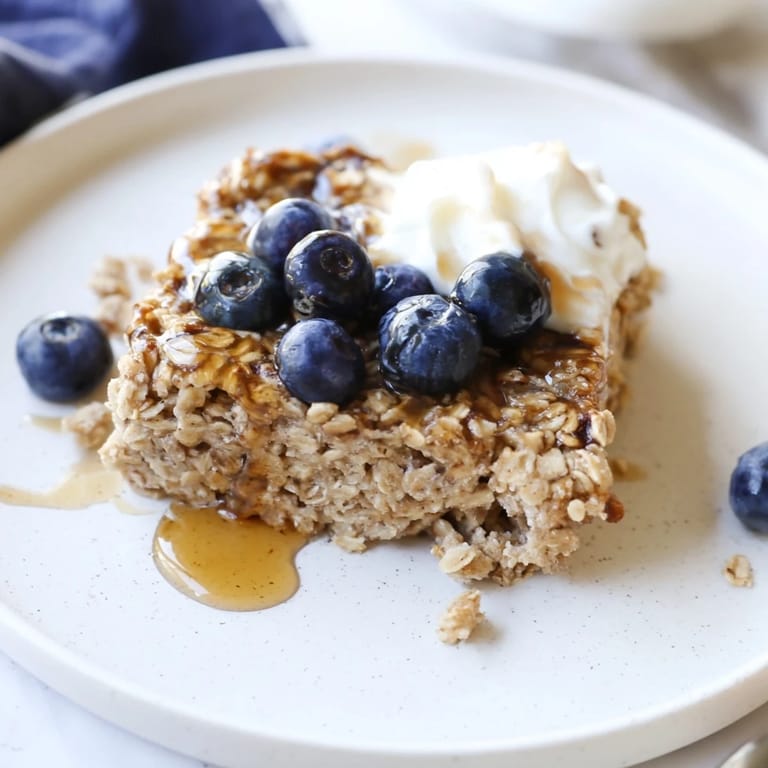 Visualize a golden, cake-like Protein Pancake Oats slice, perfect for a filling, high-protein breakfast.